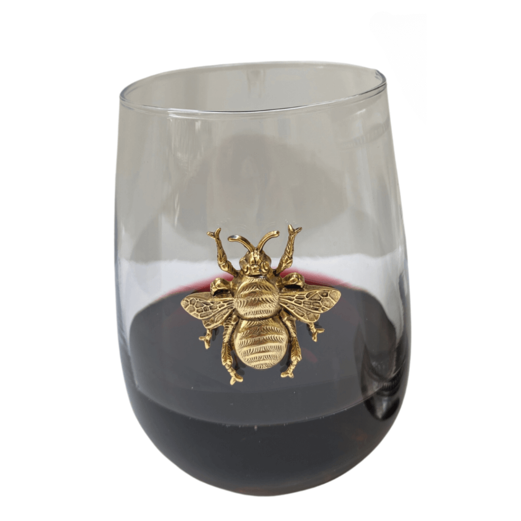 stemless wine glass with gold bee