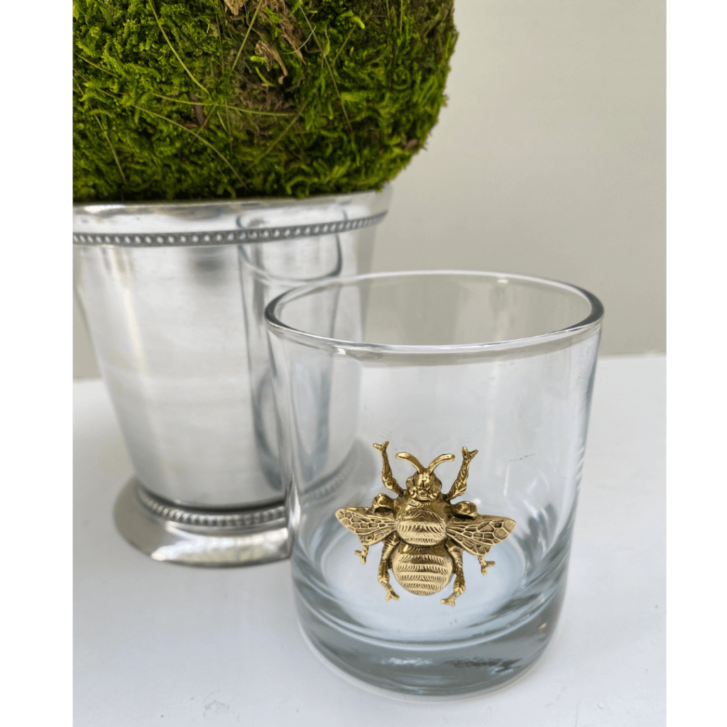 bourbon glass with gold bee